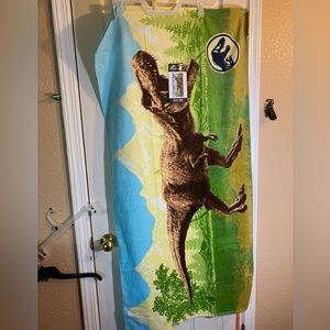 Jurassic World Beach Towel Size (27 W x 54 L Inches) Universal City Studios.